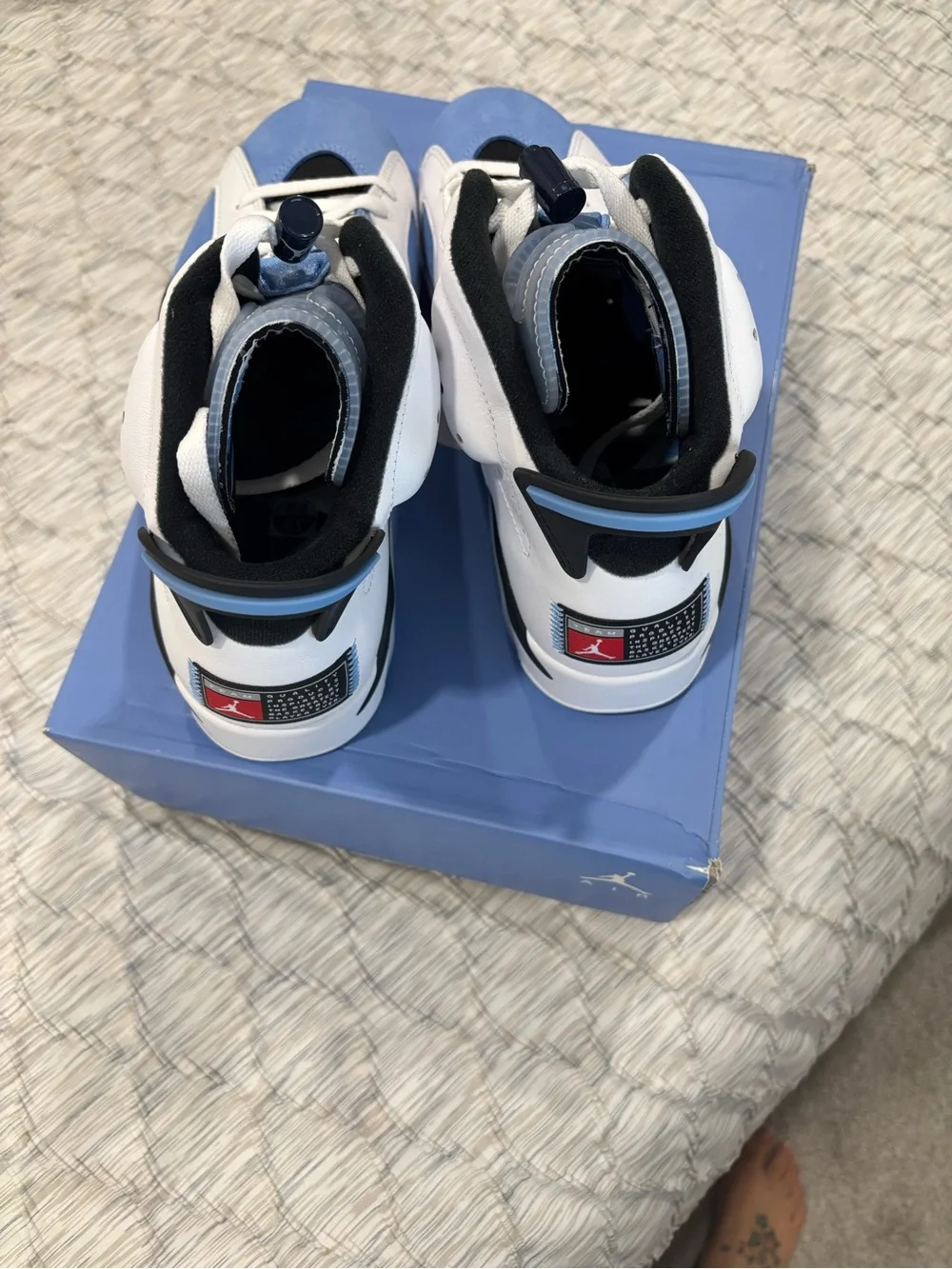 Jordan Retro High-Top Sneakers in Light Blue and White